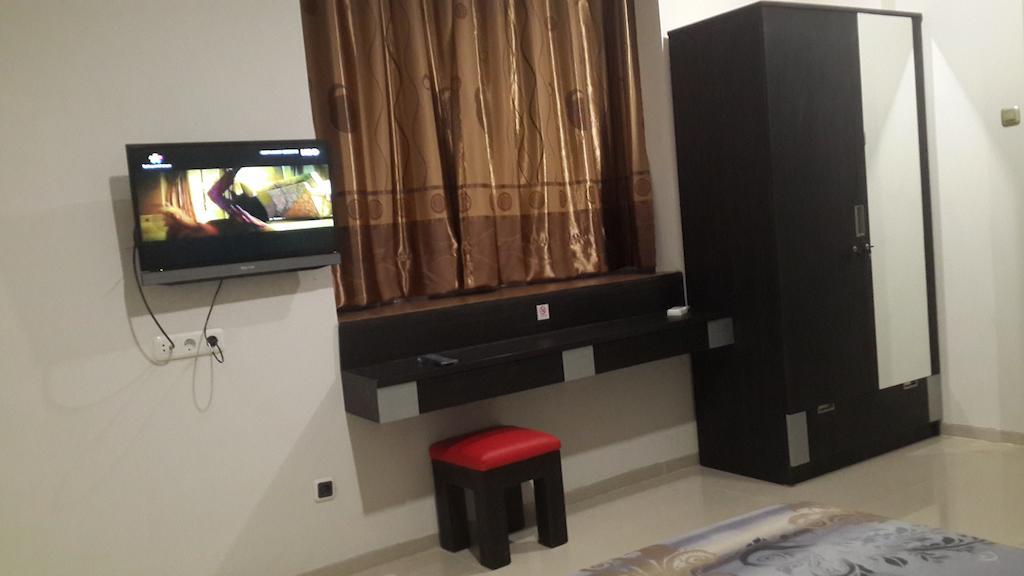 Ihome Residence Jakarta Szoba fotó